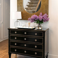 Neo Classic Black Chest in a hallway with flowers and lamp