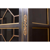 Detailed close-up of Neo Classic bookcase ornate pattern.