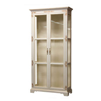 White curio cabinet with glass doors and decorative details.