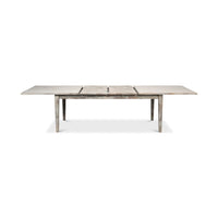 Fully extended gray painted dining table front view.
