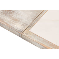 Close-up of joint on gray painted dining table.