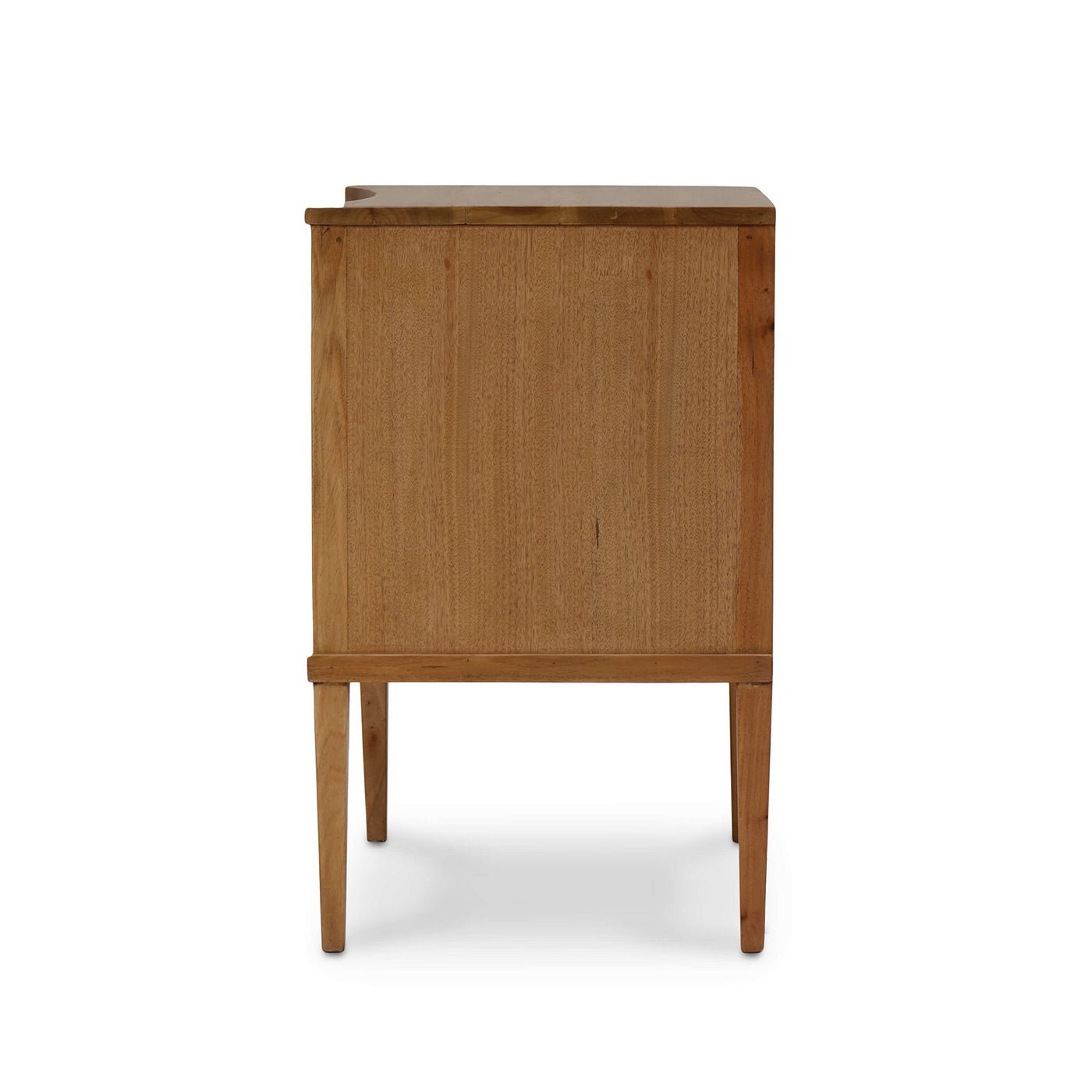 Side view of slender-legged nightstand in natural wood.