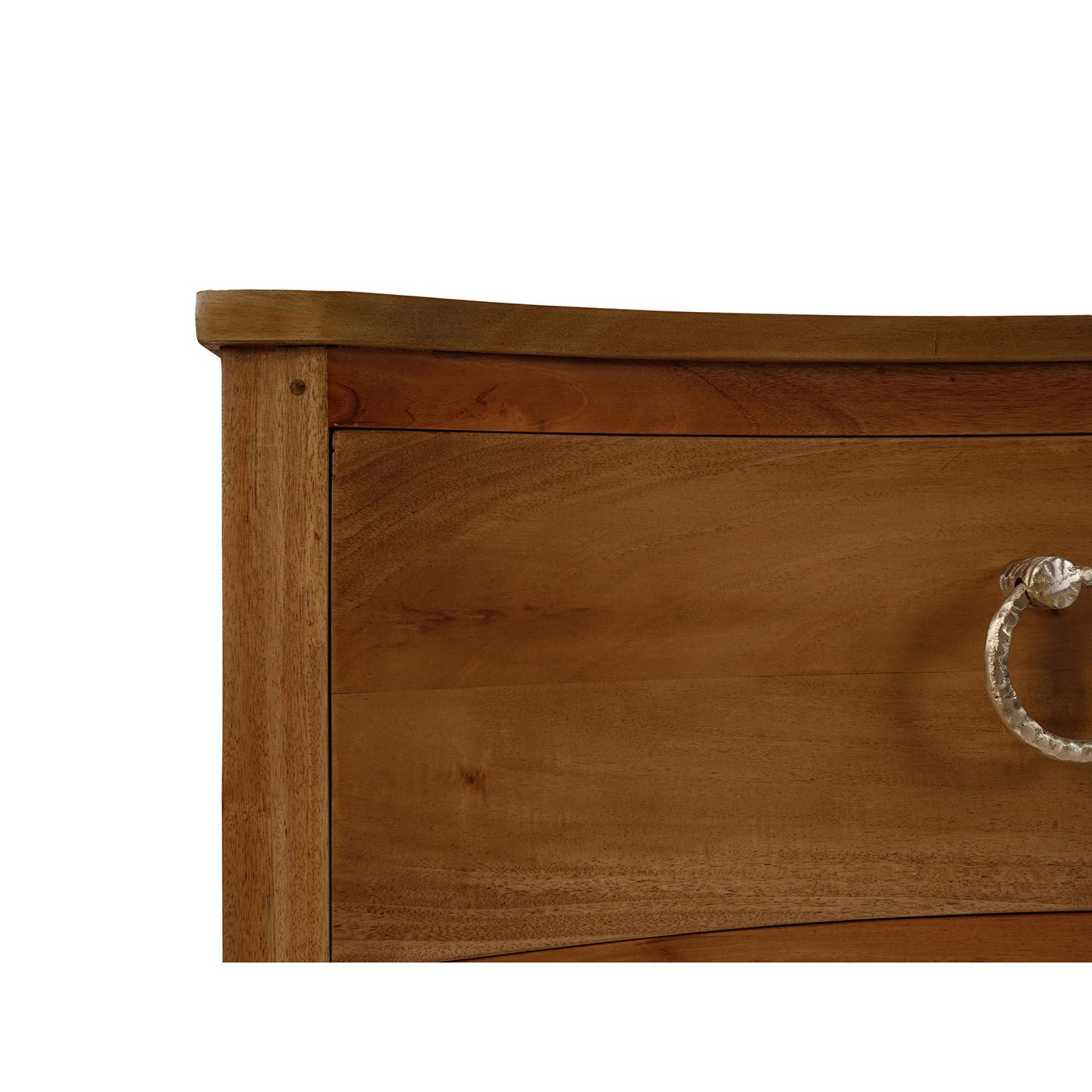 Detail of nightstand's curved edge and handle on drawer.