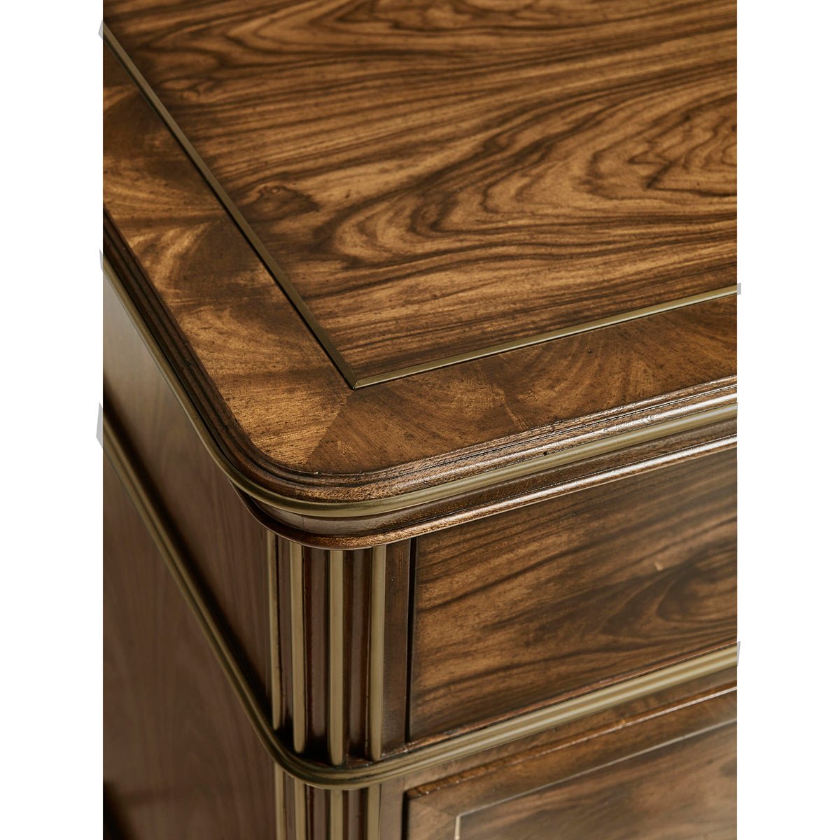 Corner detail of neo classic bedside chest, close-up.