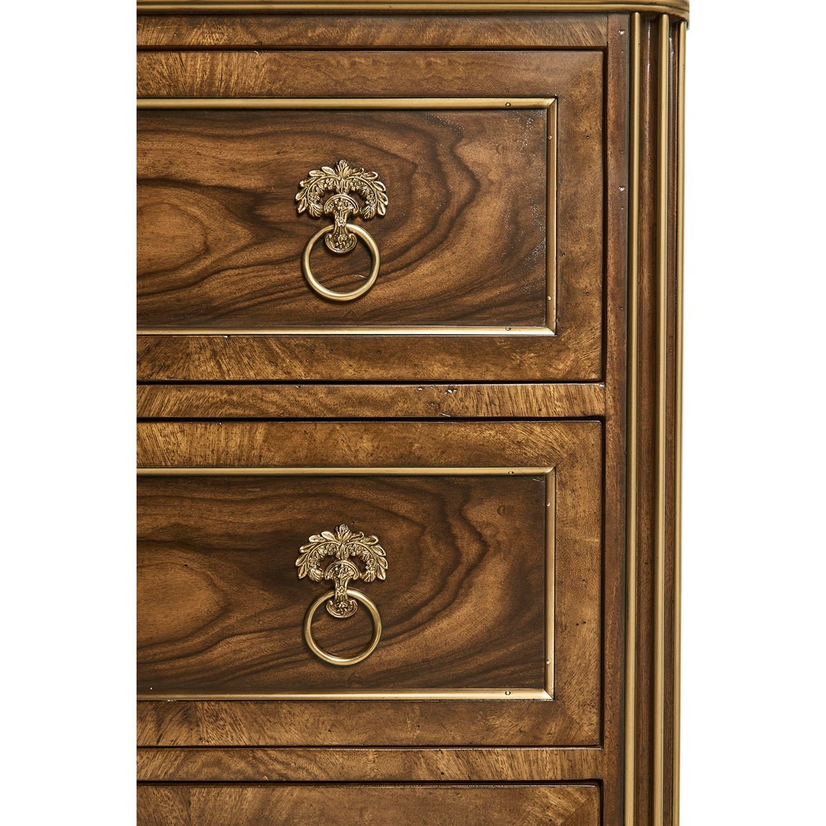 Close-up of drawer handles on classic chest.