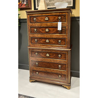 Neo classic chest displayed in decorated interior setting.