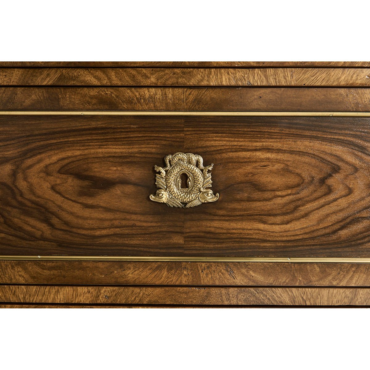 Keyhole detail, intricate design on drawer of chest.