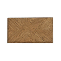 Light oak dresser top view, intricate wood surface design.