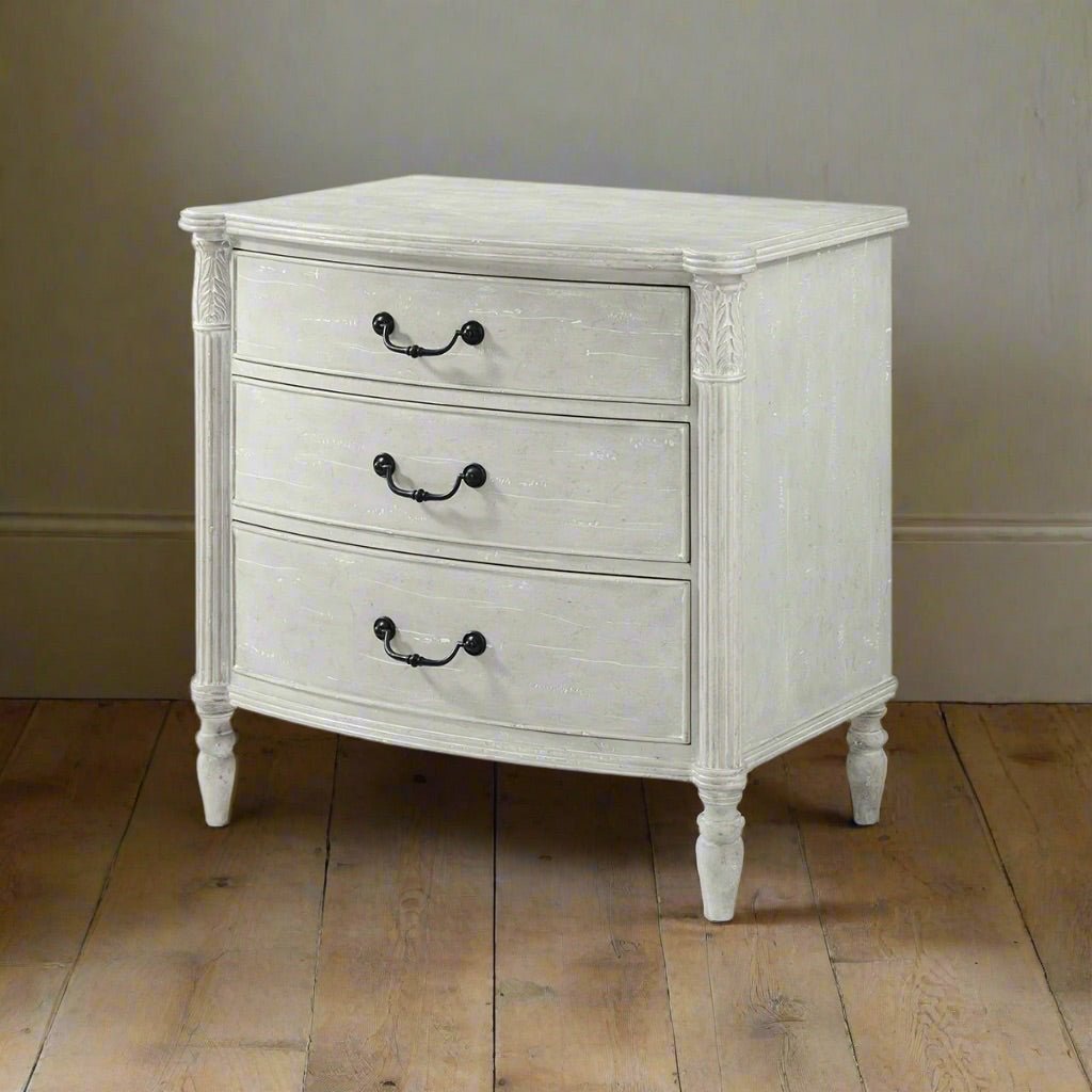 Light gray nightstand, wood floor setting, side perspective.