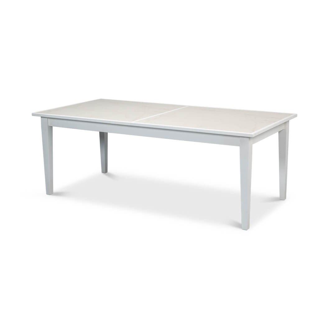 White dining table, non-extended, angled view.
