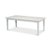 White dining table, non-extended, angled view.