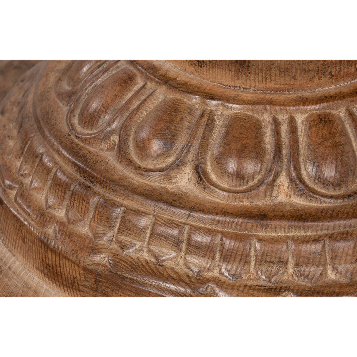 Intricate base carvings and texture, neoclassical bistro table.