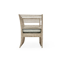 Left side view of bench, features cushion and slats.