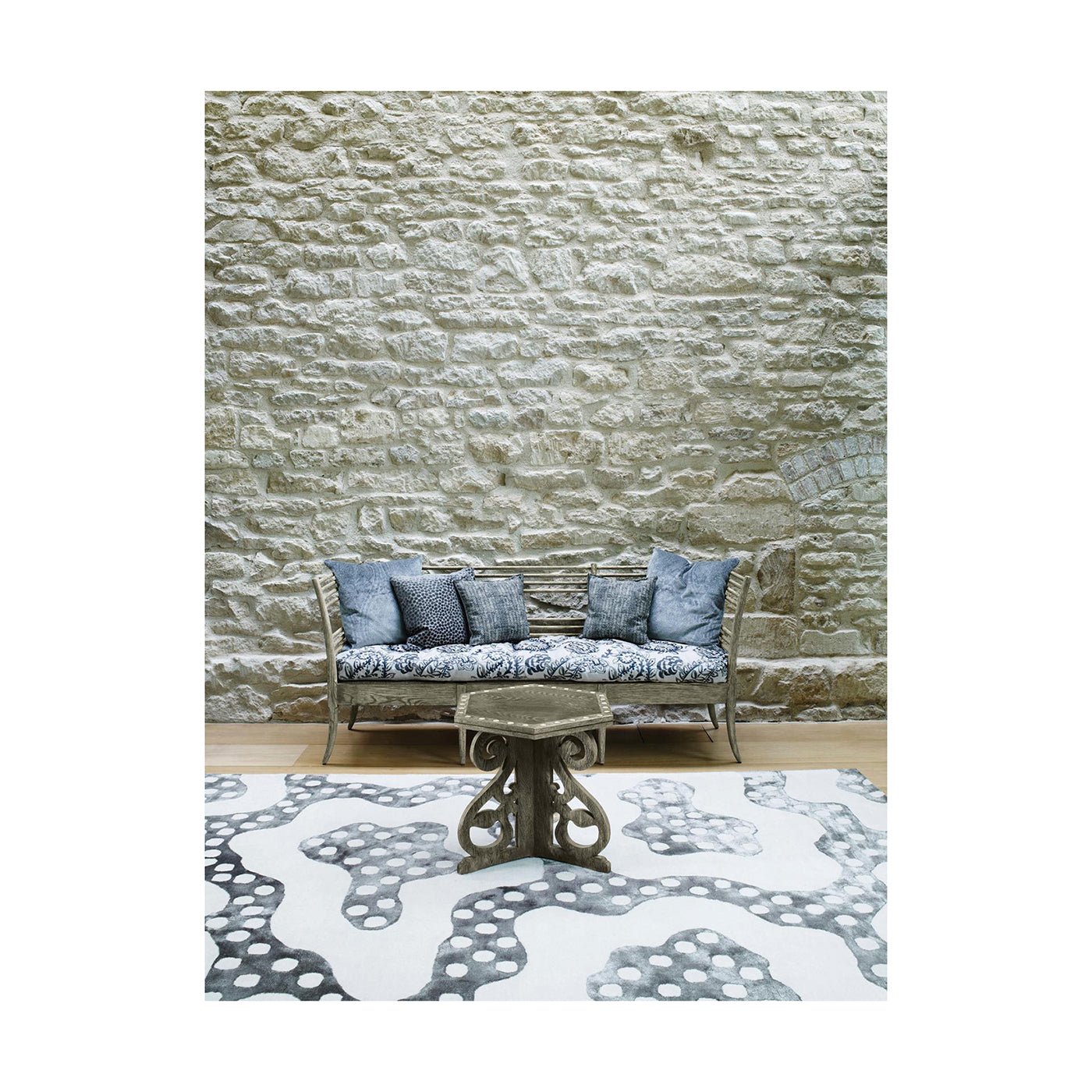 Styled Gustavian bench with pillows in living room.