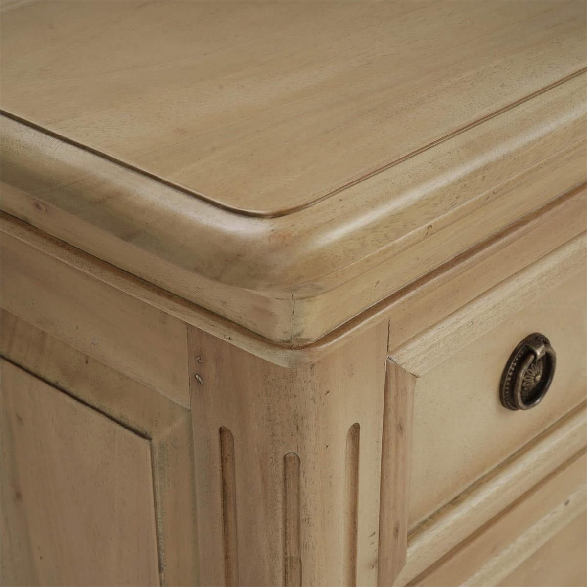 Detailed corner of neoclassical nightstand, showcasing grain.