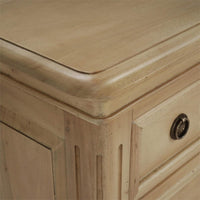 Detailed corner of neoclassical nightstand, showcasing grain.