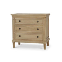 Neoclassical nightstand front view with closed drawers.