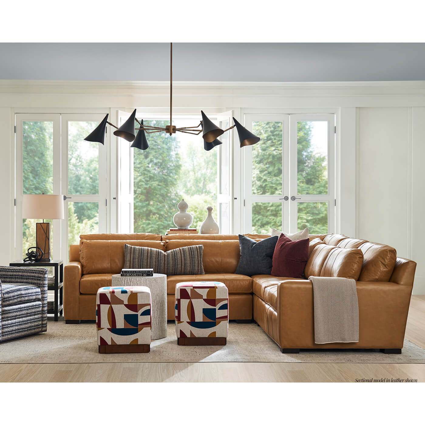 Living room with tan leather Nest Deep sectional.