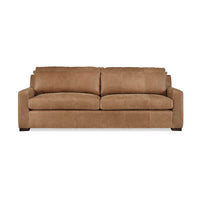 Front view of tan leather Nest Deep Custom sofa.