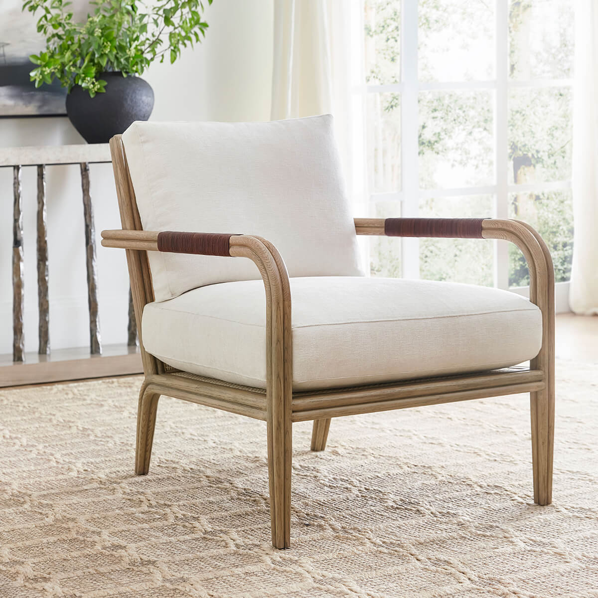 Newport Coastal Armchair, room setting with cozy staging.