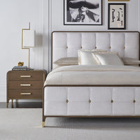 Bed and nightstand in bedroom, Hollywood Regency elegance.