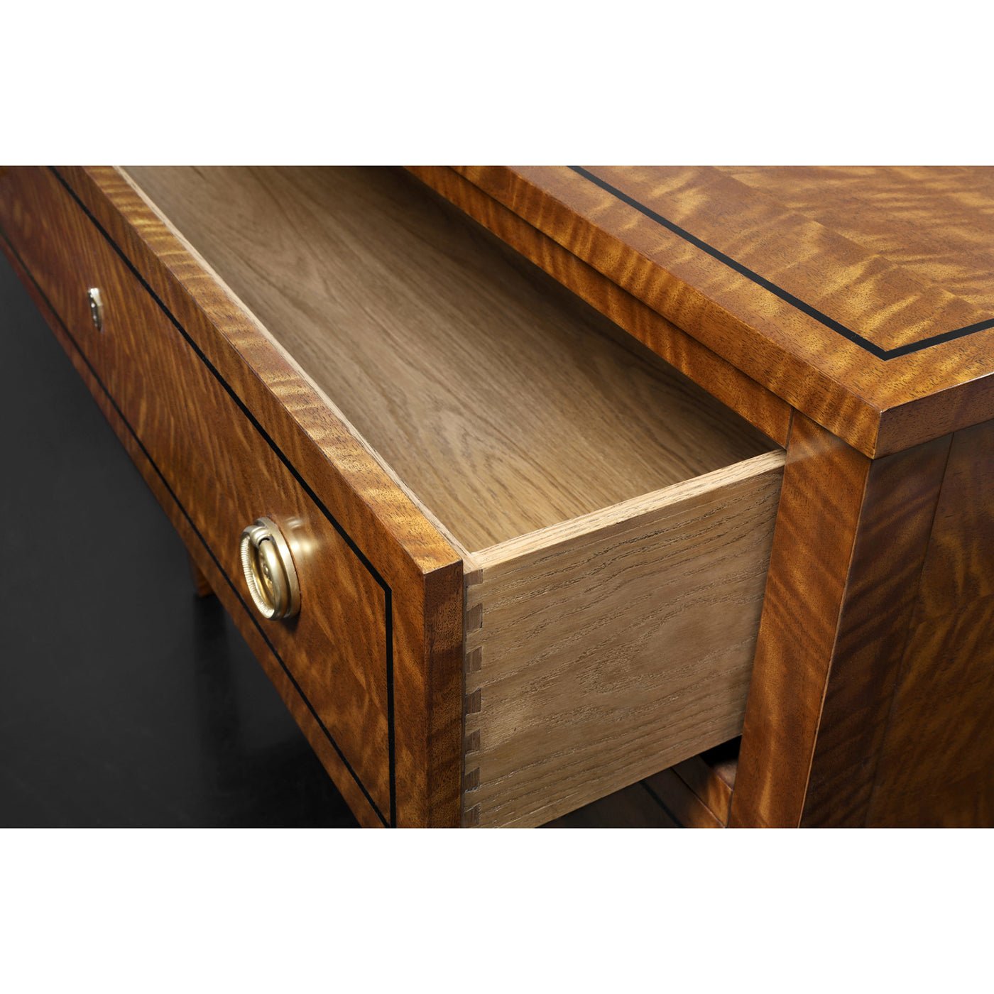 Open drawer of Northern European style commode chest.