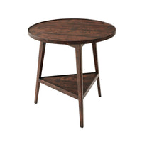 Round wooden cricket table with angled legs, front view.