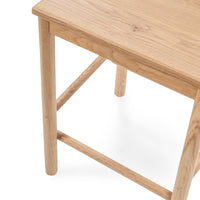 Detail of the oak seat edge, legs and built-in wood footrest