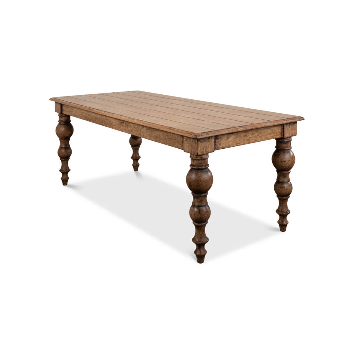 Perspective view of oak farmhouse dining table.