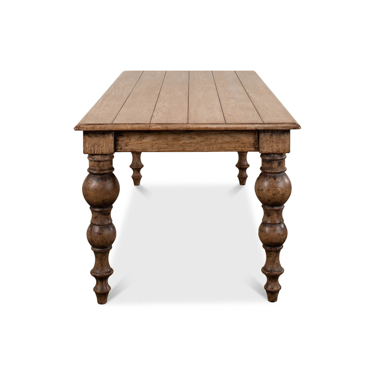 End view of oak farmhouse dining table.