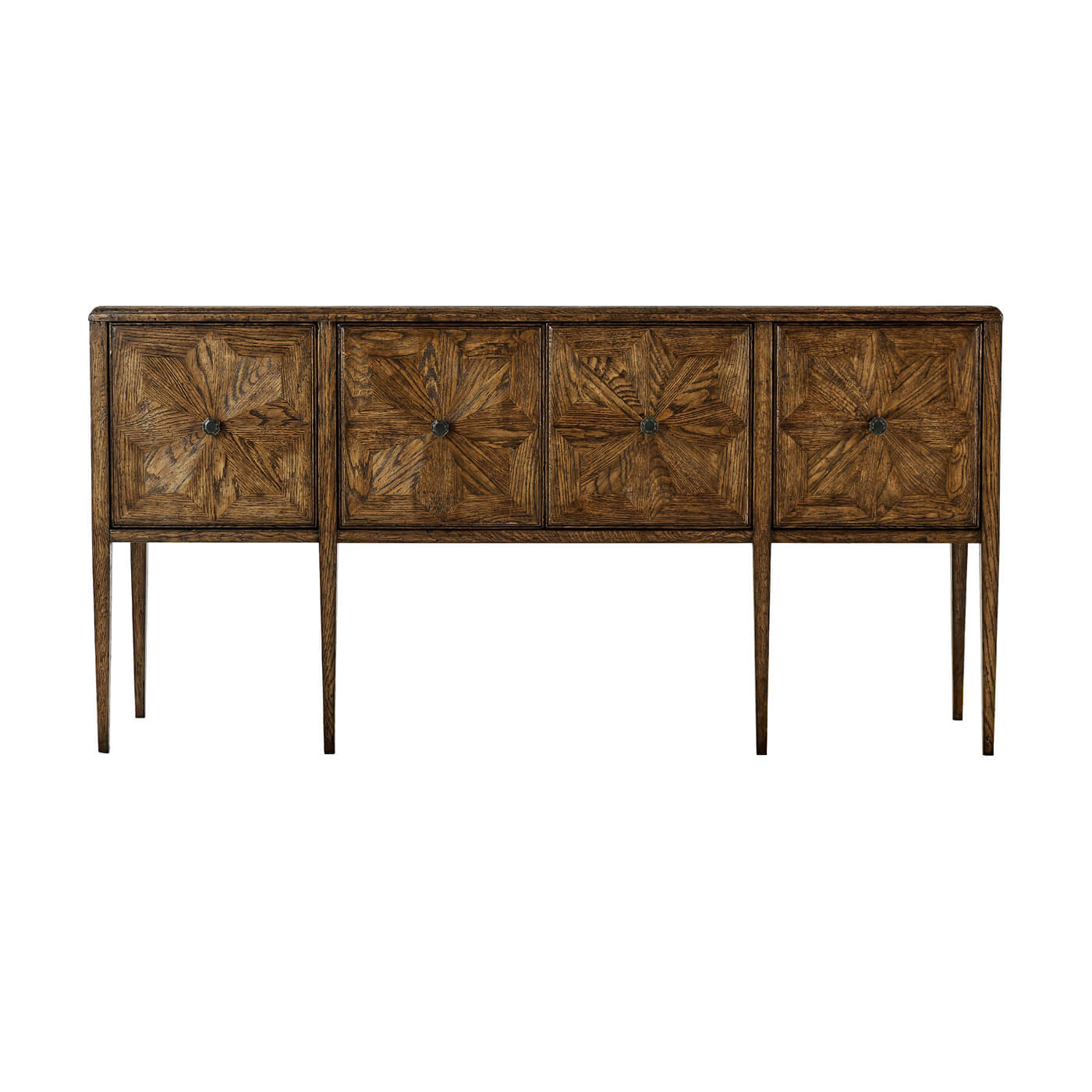 Front view, oak four door buffet with intricate design.