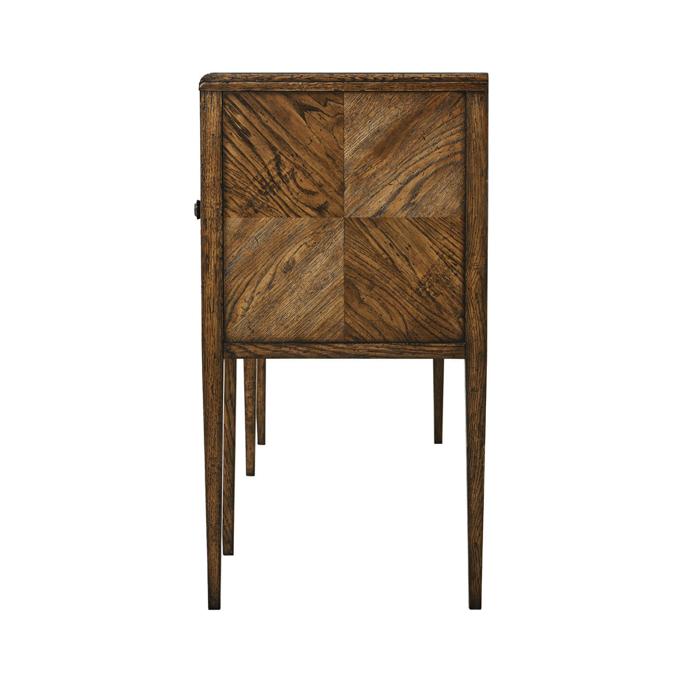 Side view, oak four door buffet, leg and pattern detail.