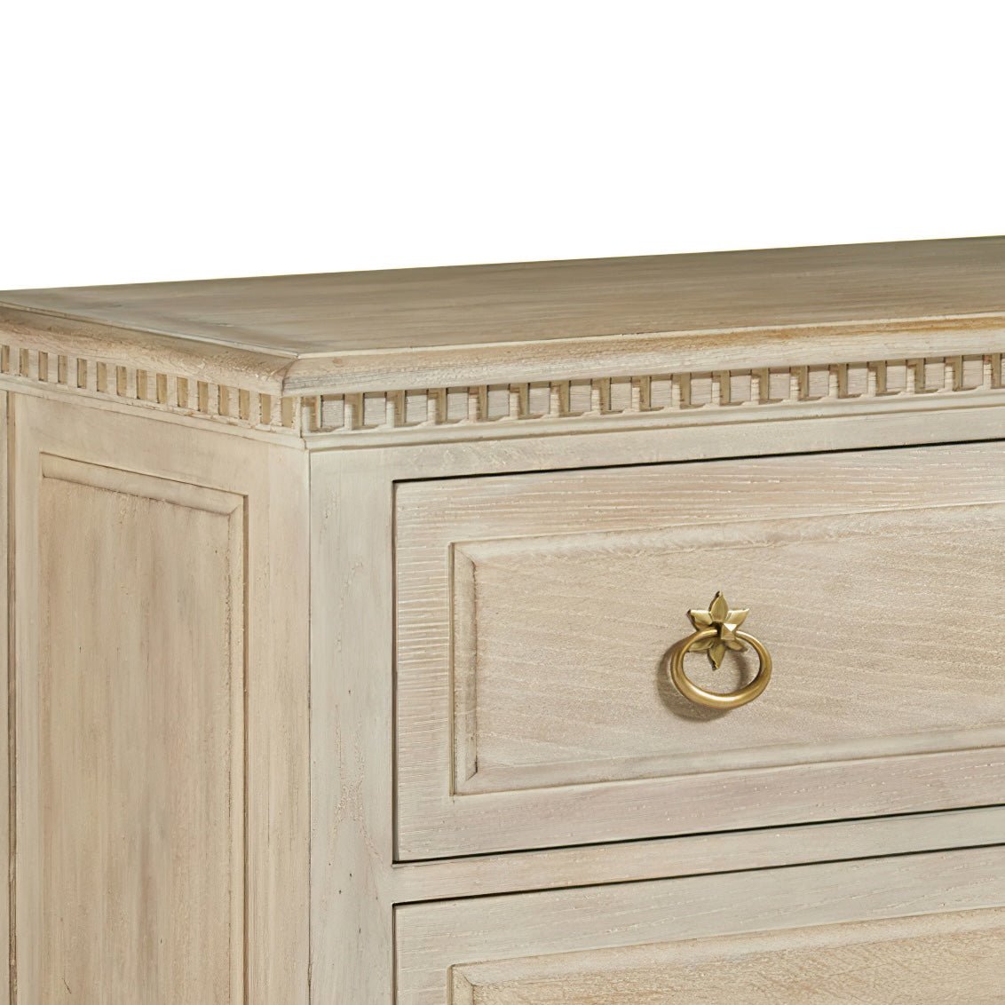 Close-up of Oak Louis XVI chest detailing.