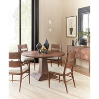 Oak dining chairs in elegant dining room setting.