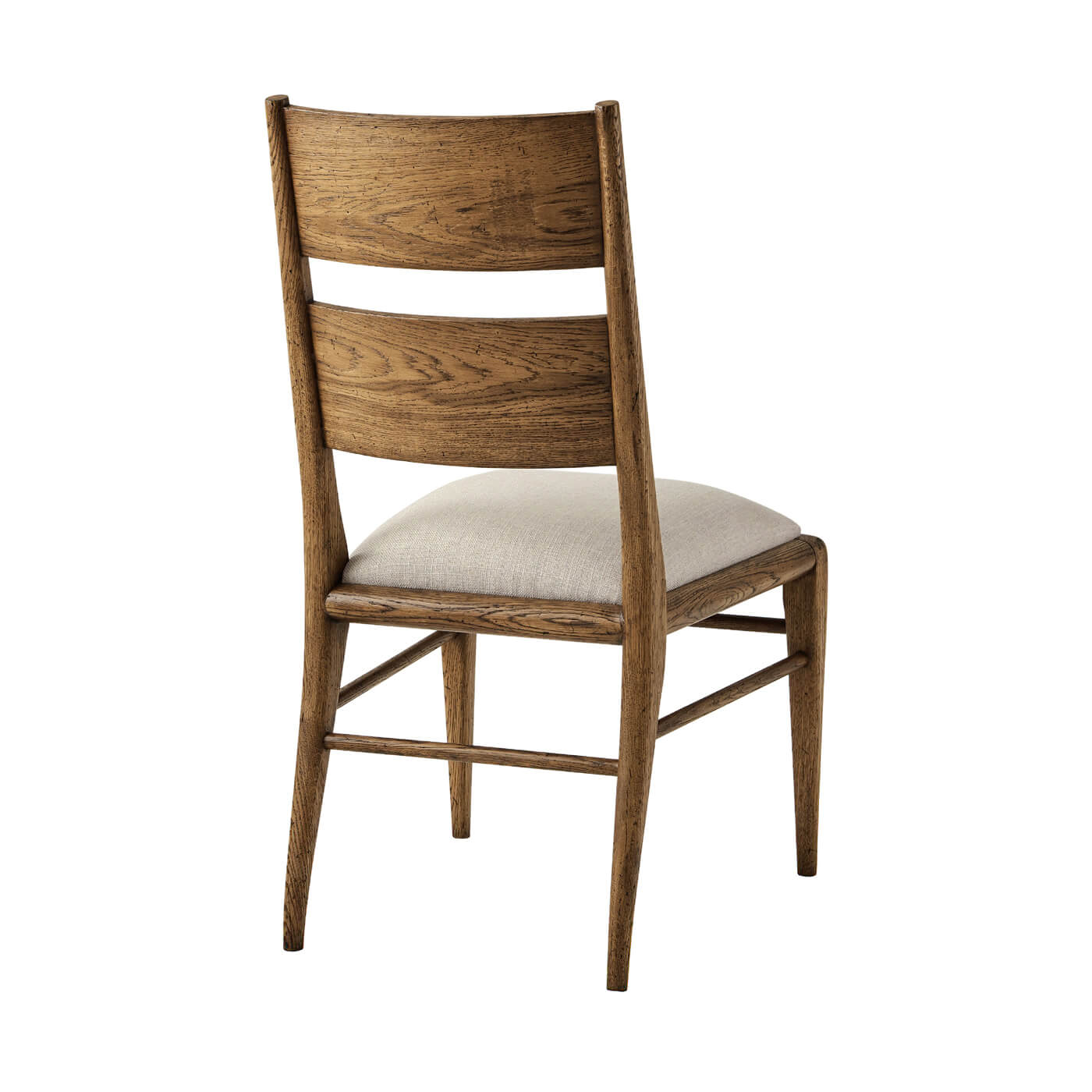 Back view of oak dining chair with cushion.