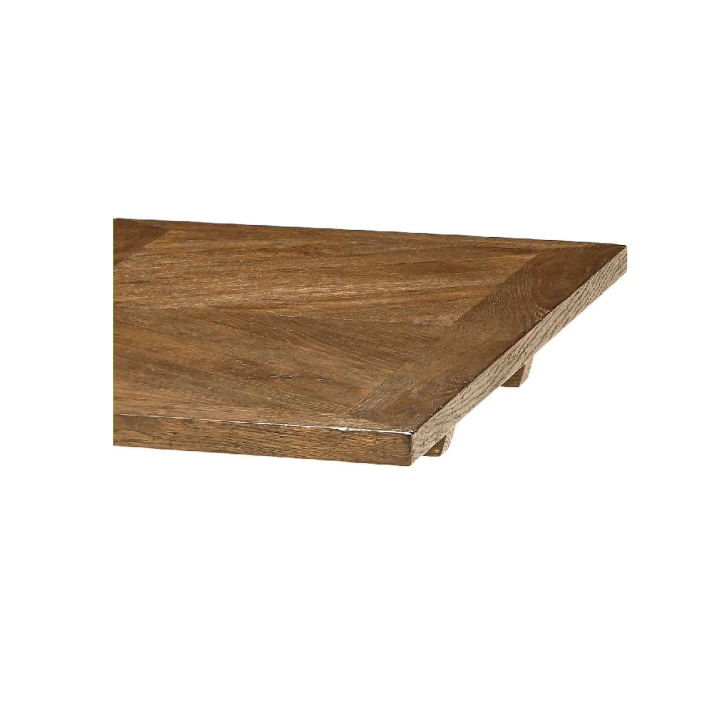 Close-up of oak parquetry table corner detail.