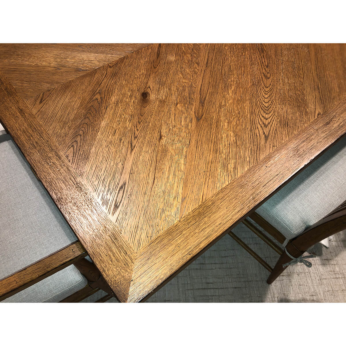 Close-up of oak parquetry table surface texture.