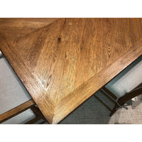 Close-up of oak parquetry table surface texture.