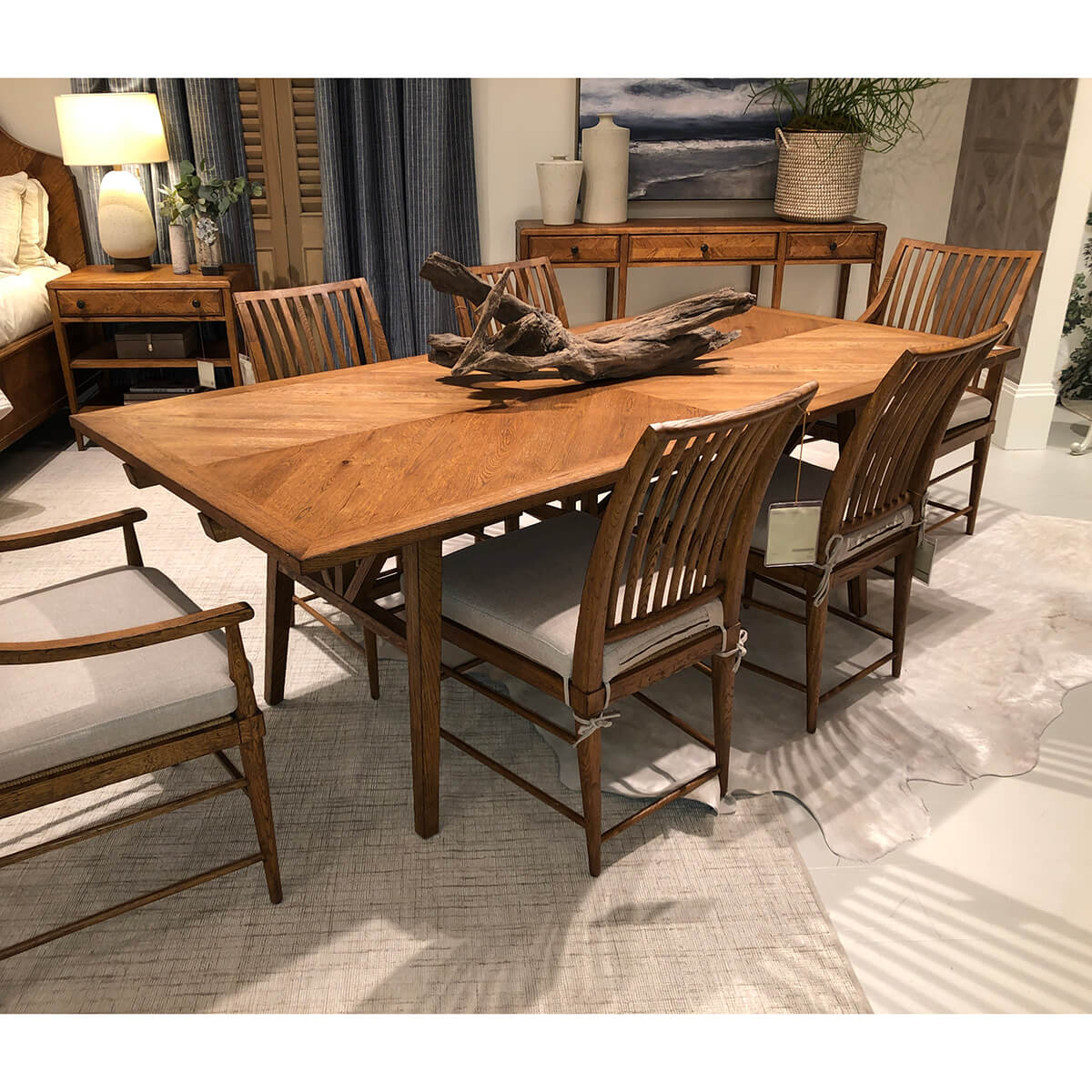 Styled room featuring oak dining table and chairs.