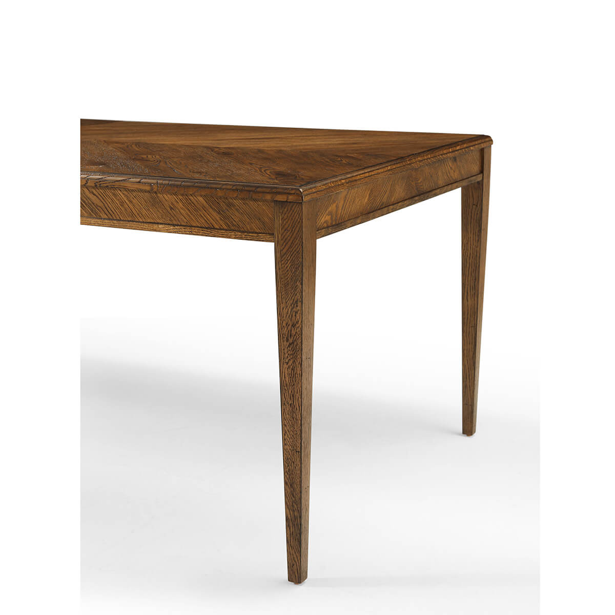Close-up of dining table corner, showcasing wood grain.