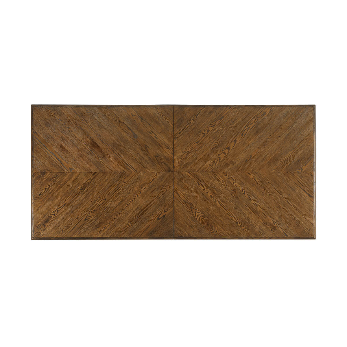 Top view of oak dining table, showing parquetry design.