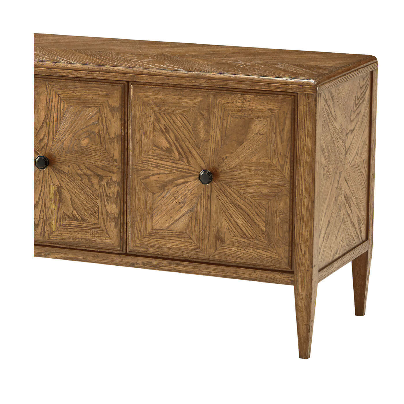 Close-up of oak cabinet detailing, knob visible.