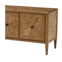 Close-up of oak cabinet detailing, knob visible.