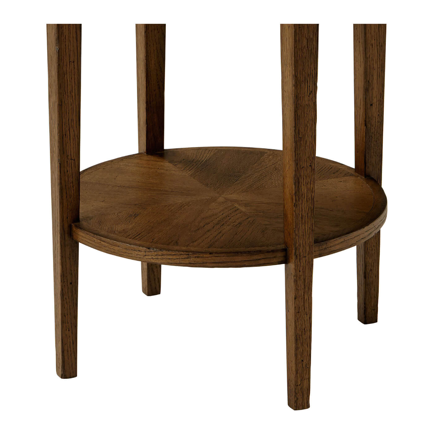 Close-up of round side table, lower shelf detail.