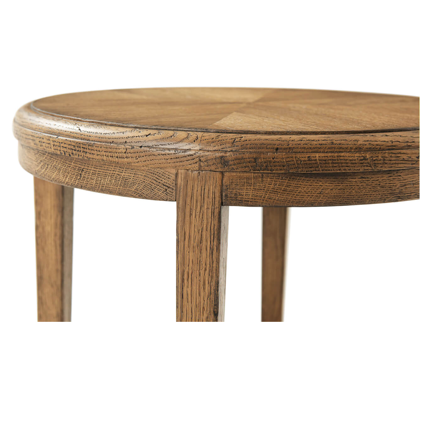 Close-up on oak table top and leg detail.