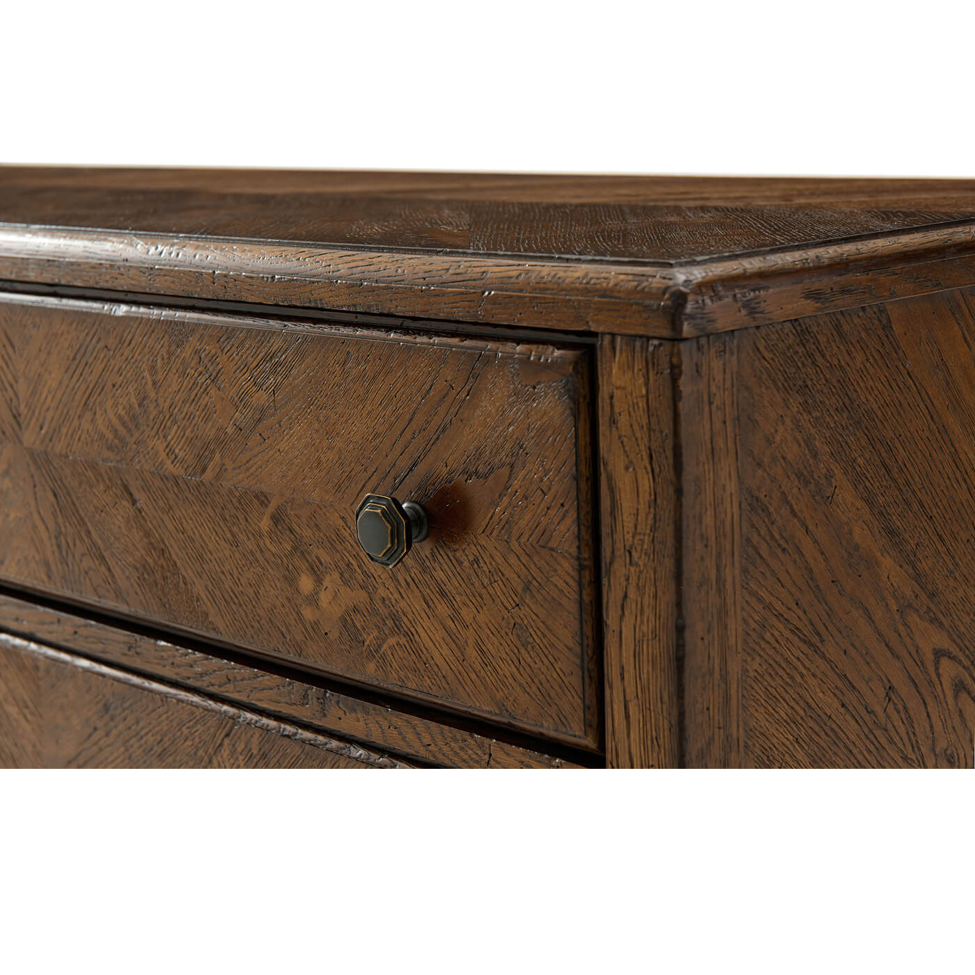 Close-up of dresser drawer corner and handle detail.