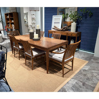 Oak console table in dining room setting.