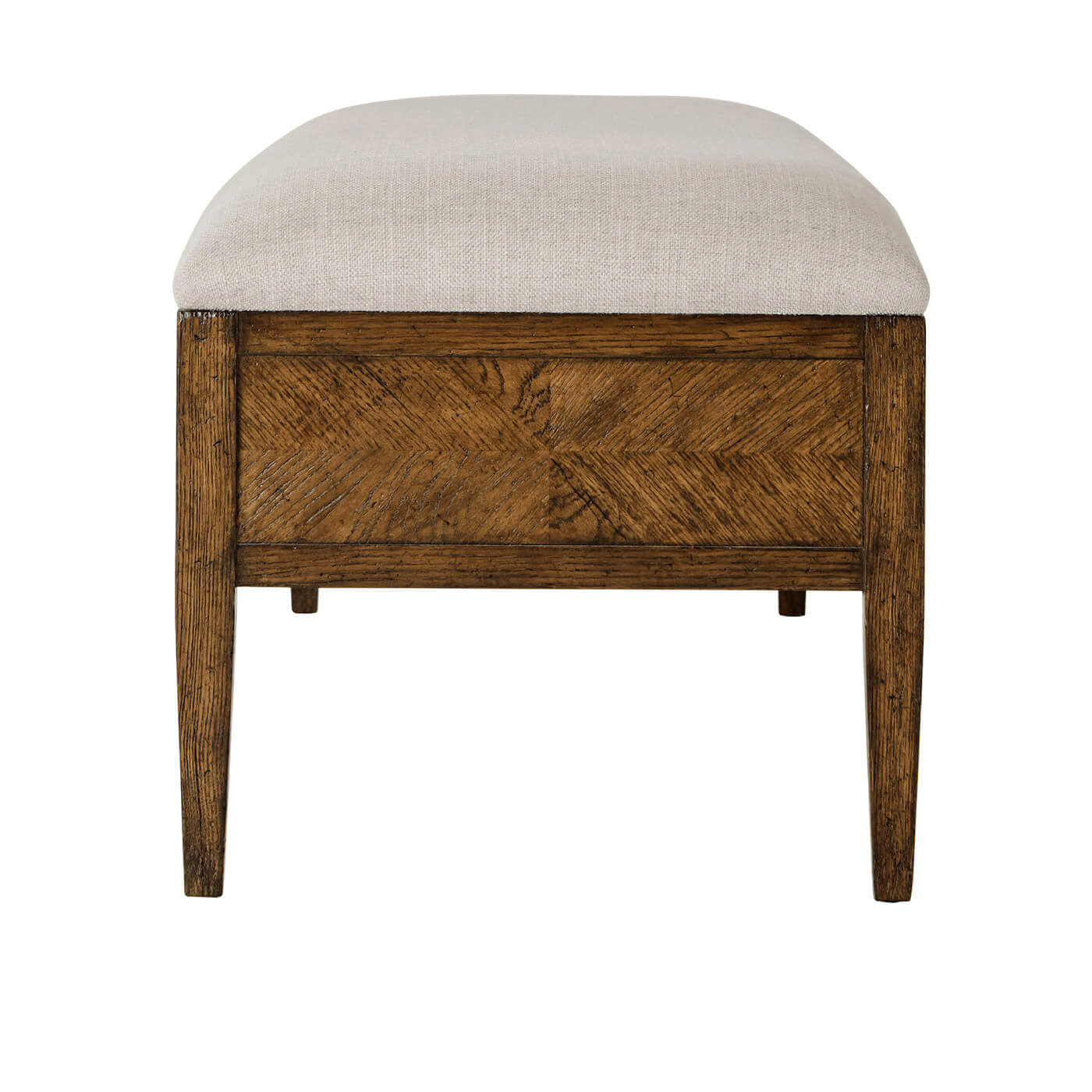 Upholstered bench side end view, dark oak legs detail.