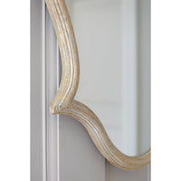 Close-up of the oak frame on Venetian mirror.