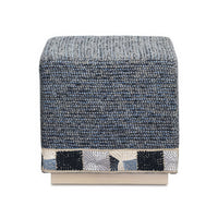 Front view of blue cube ottoman with pattern trim.